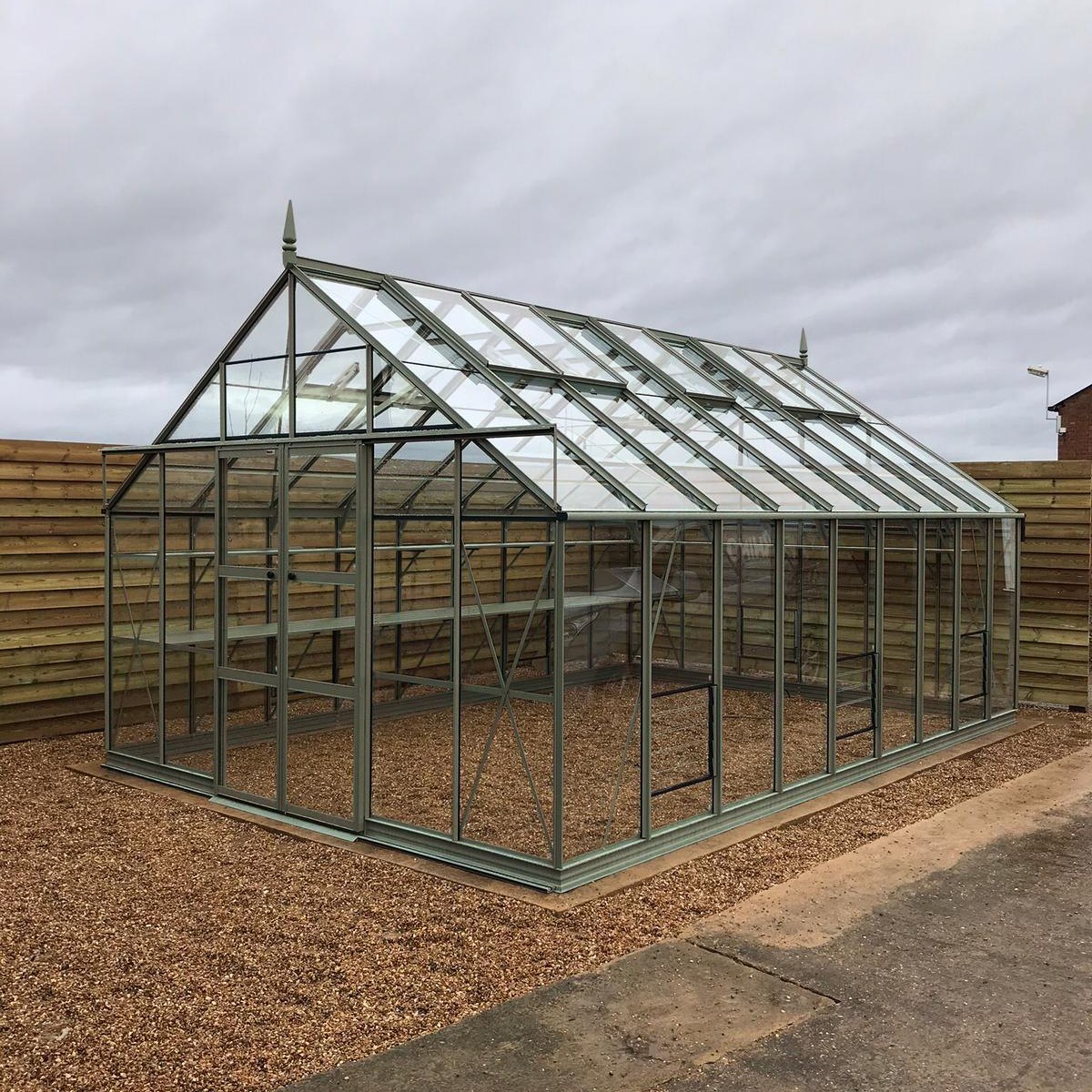 12x18 rhino premium on a brick perimeter surrounded by gravel