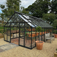 12x20 midnight slate greenhouse with a dining area inside