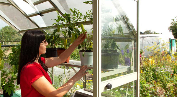 Ellen in her Rhino Greenhouse