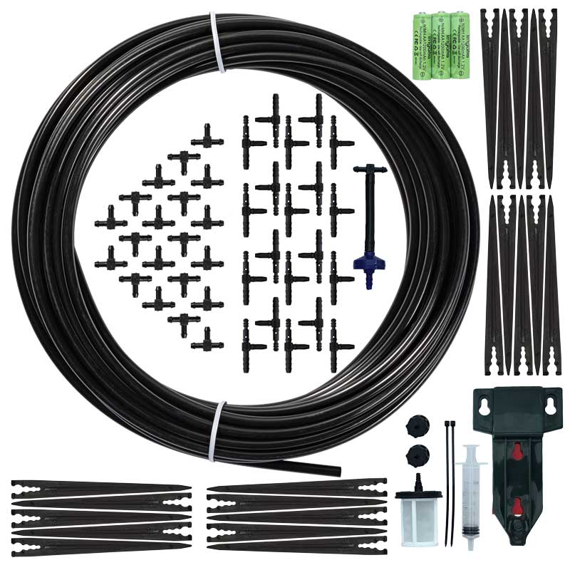 The image shows a garden irrigation kit, including a coiled black hose, various connectors, stakes, a syringe, and a filter, arranged on a plain white background.