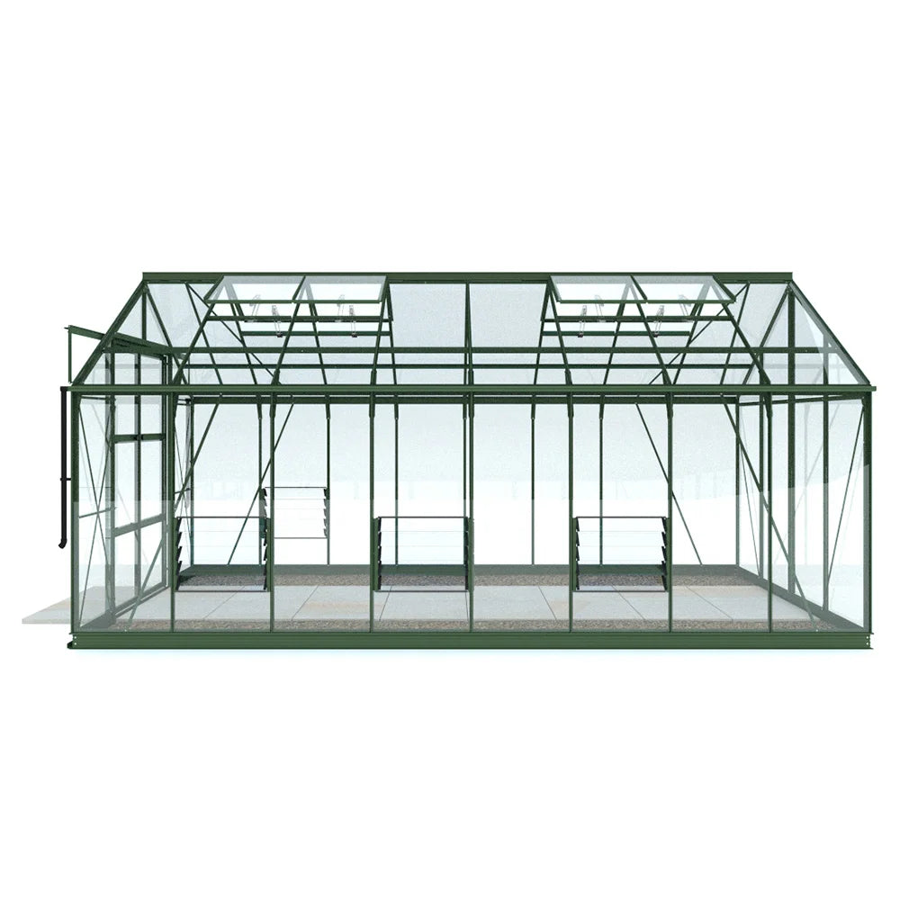 A large, green metal-framed Rhino Greenhouse with glass panels stands empty. It features a door and roof vents, set on a paved surface, highlighting its spacious interior suitable for gardening.