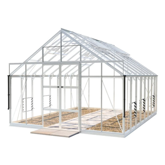 Glass Rhino Greenhouse with a white frame stands empty. The structure has open panels and sliding doors, situated on a stone pathway, with a white background.